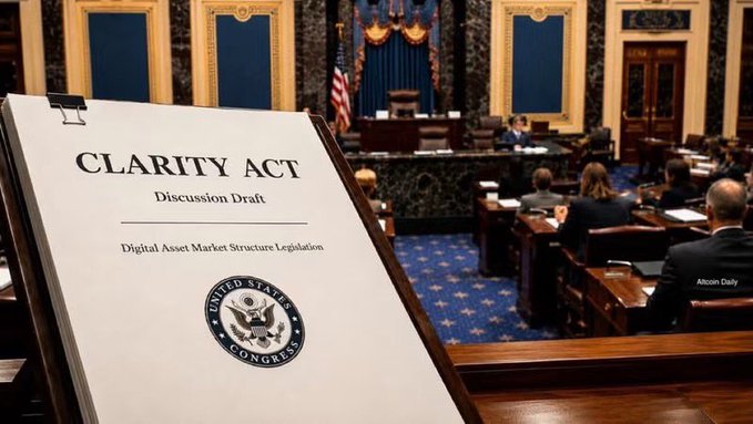 A discussion draft of the 'CLARITY ACT' digital asset market structure legislation displayed on a clipboard, with the U.S. Congress seal visible, set in front of a blurred Senate hearing room.