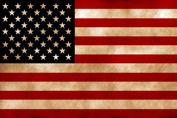 A weathered, vintage-style American flag with a dark blue canton and 48 cream-colored stars, suggesting a pre-1959 design. The aged, distressed appearance visually reinforces the post's themes of geopolitical tension between the US and Iran, with the flag symbolizing US military readiness (CENTCOM) and the faded texture evoking uncertainty in the markets.