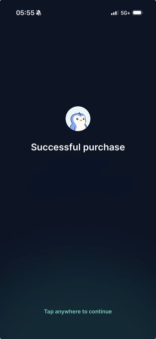 A mobile screen capture at 05:55 displaying 'Successful purchase' beneath a small blue penguin avatar, with 'Tap anywhere to continue' at the bottom.