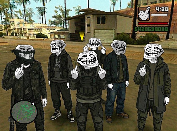 The user wants a concise caption describing the image.
I need to identify the key elements:
- **Visuals:** It's a screenshot from the video game Grand Theft Auto V (GTA V). There are six characters standing in a row.
- **Masks:** All characters are wearing the "Trollface" meme mask. One character on the far left has a black bandana with "GTA MAD BROS" written on it.
- **Action:** They are all making hand gestures (middle finger or pointing).
- **UI Elements:** Top right corner shows a timer "4:20", a hand icon (likely indicating a wanted level or specific action), a health bar, and a large amount of money "$420698008". Bottom left shows a minimap with an 'N' for North.
- **Context:** The post text says "Trolling is always better with friends $TROLL #Solana". This confirms the