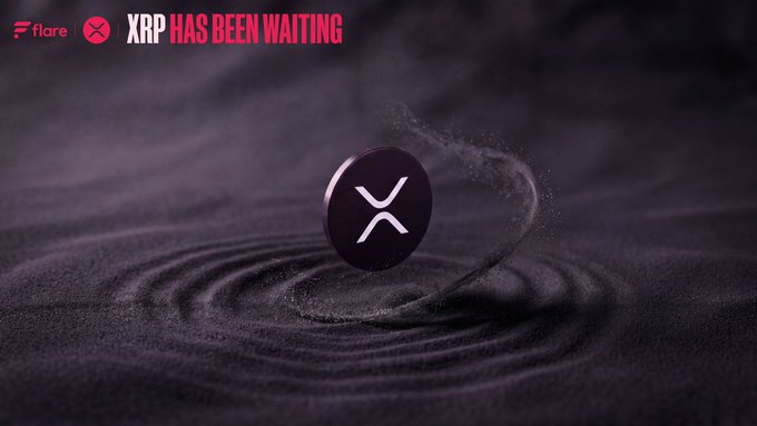 A sleek promotional image features a black XRP coin suspended mid-air above rippling sand, with swirling particles dancing around it against a dark background. The text "XRP HAS BEEN WAITING" appears in white and pink at the top alongside the Flare logo, reinforcing the post's message about activating idle XRP through a vault.

The image ties to the post by visually representing XRP's dormant state (the still coin) contrasted with the dynamic motion (the swirling sand), symbolizing the potential energy ready to be unlocked.