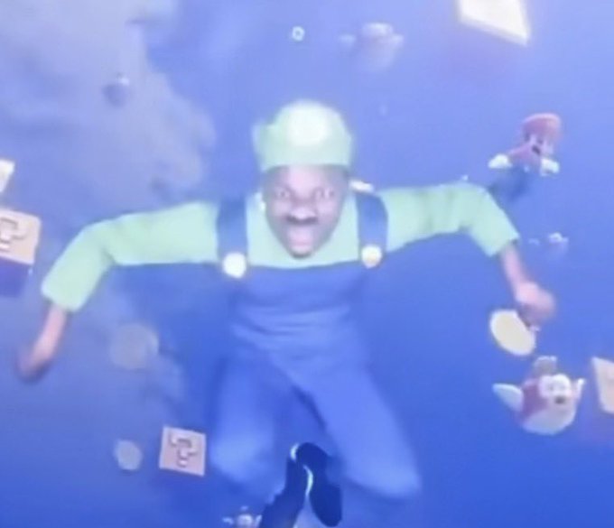 A blurry, low-resolution screenshot from what appears to be a music video or skit, showing a man in a green shirt and overalls jumping among floating question mark blocks in a blue, sky-like background.