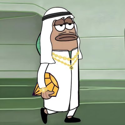 A cartoon character resembling a fish or similar creature wearing traditional Middle Eastern attire including a white robe and headscarf, adorned with gold chains and carrying a gold item.
