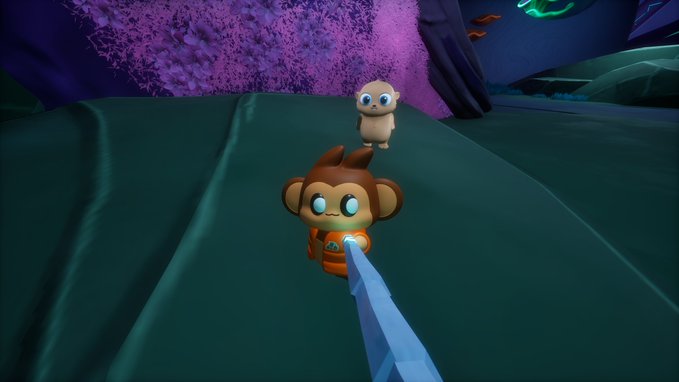 A first-person view from a video game shows a small chimp-like character with glowing blue eyes holding a futuristic blue weapon, while another similar character stands further back on a teal surface surrounded by purple foliage. The image illustrates the user playing "Otherside Meta" with their Chimpers NFT character alongside another player.