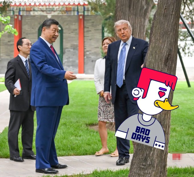 The image features a man wearing a suit standing next to a tree, with a cartoon duck sitting on one of the branches. The man appears to be talking to another person who is also dressed in a suit. In the background, there are other people present as well. A post has been created about this scene, and it includes an image of the cartoon duck along with some text that reads "Me trying to hide my ORIGINALS mint so nobody notices the 2x leaderboard boost...Meanwhile @Appreciators_IO already pulling everyone into the movement Minting ORIGINALS isn't just art it's campaign advantage: 2x multiplier $APE leaderboard race holder only NFT rewards". The post seems to be promoting a political event or gathering, and the cartoon duck adds an element of humor to the scene.