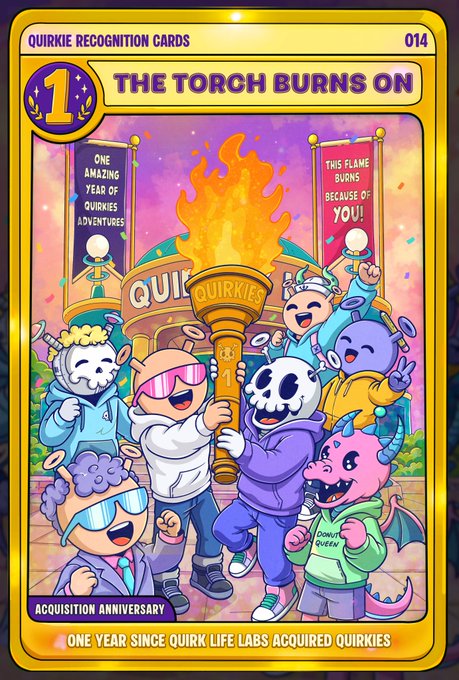 A colorful 'Quirkie Recognition Cards' collectible card #014 titled 'THE TORCH BURNS ON,' commemorating one year since Quirk Life Labs acquired Quirkies, featuring cartoon characters celebrating around a flaming torch.