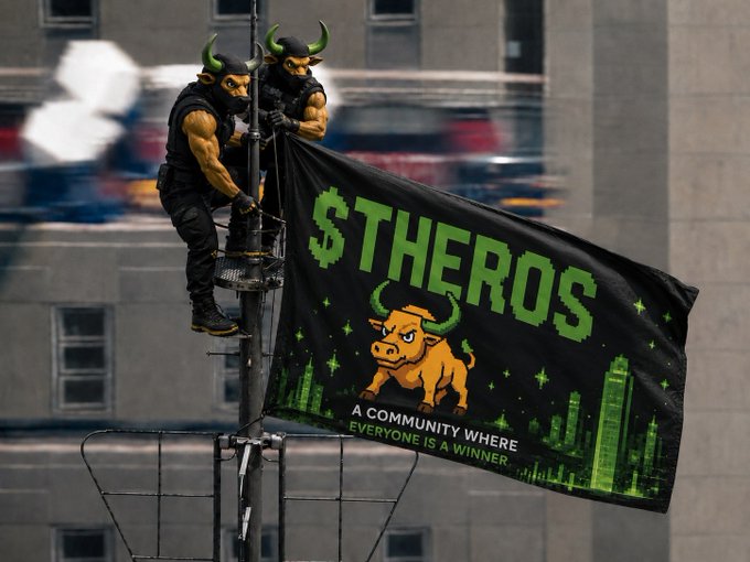 Two people in bull masks and horns hanging a '$THEROS' flag with a cartoon bull mascot reading 'A COMMUNITY WHERE EVERYONE IS A WINNER' from a city building.