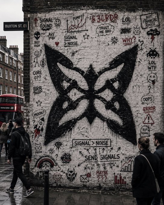 A street art mural on a London building (Buxton St. E1) featuring a large butterfly symbol surrounded by handwritten tags including 'F3CPDR', 'SIGNAL > NOISE', and 'SEND SIGNALS'.