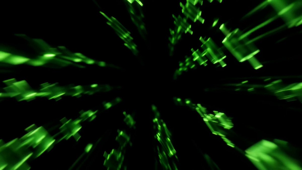 The image shows a close-up view of a green screen with white lines or dots scattered across it. The background appears to be black, which contrasts with the vibrant green color of the screen. The focus of the image seems to be on the green screen, and there is no text present in the image.