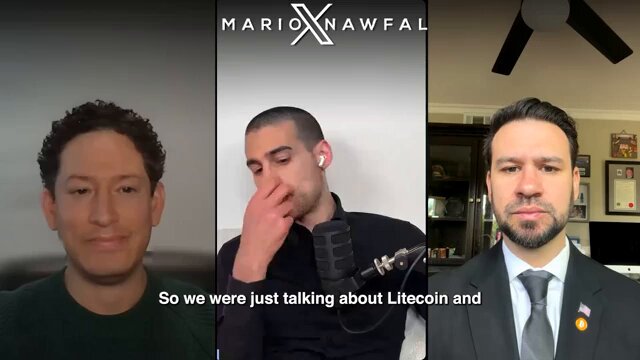 The image shows three men sitting next to each other, with one man wearing a suit and tie while another has his hand over his face. The third man appears to be talking about cryptocurrency or blockchain technology.