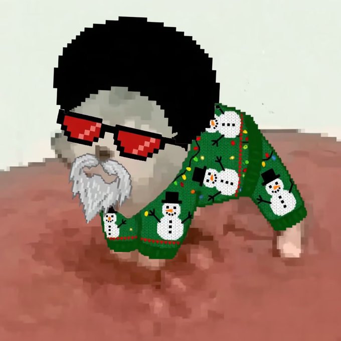 A pixel art image of a man with a white beard, wearing pixelated red sunglasses and a black beanie, holding a green holiday sweater decorated with snowmen.