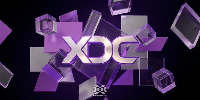 A stylized 3D graphic displays the "XDC" logo in metallic silver and purple lettering, surrounded by floating translucent purple and clear cubes against a black background, with a small "Cenfinity" branding at the bottom. The image visually reinforces the post's promotion of the XDC Network's blockchain and fintech capabilities.