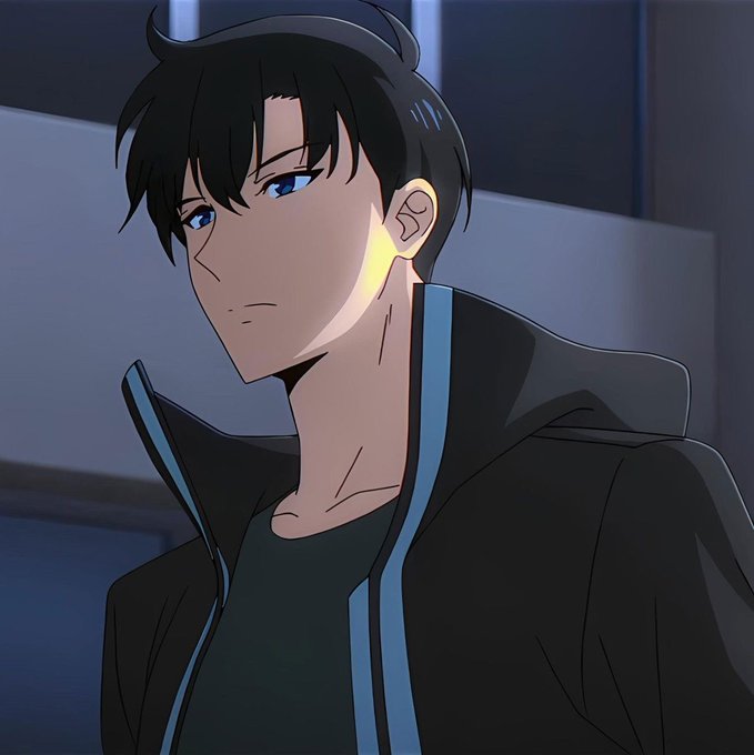 An anime-style illustration of a young man with dark hair and blue eyes wearing a black hooded jacket over a dark shirt, with light illuminating the side of his face.