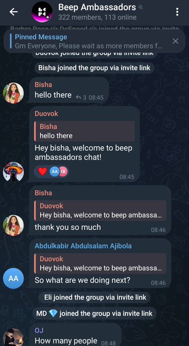 The image shows a cell phone screen displaying multiple messages from different people, including a conversation between two individuals named Bisha and Duvok. The messages are arranged vertically with each person's name at the top of their respective lines. The text on the messages is in black color, making it easy to read. One message reads "Hello there", while another one says "Hola, welcome to Beeep.com". The screen also shows a post that mentions the hashtag #beeepit and the number "0xbeepit" which could be related to the project they are working on or an event happening in their lives.