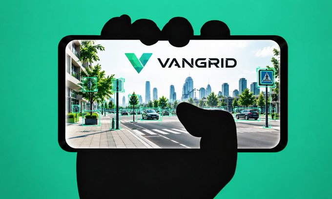 A black silhouette of a hand holds a smartphone displaying the Vangrid logo and a city street scene with green bounding boxes around objects.