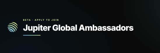 A promotional banner for the "Jupiter Global Ambassadors" program displayed on a black background, featuring a gradient wave-like logo and text reading "BETA · APPLY TO JOIN." The image directly illustrates the ambassador application program mentioned in the post, inviting viewers to join Jupiter's mobile ambassador initiative.