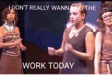 The image features a group of three women standing next to each other, with one woman wearing a brown dress and two others wearing brown tops. They are all dressed up for work or school, suggesting that they might be attending an event or gathering related to their daily routines. The caption "I don't really wan" is written above the image, which seems to be a humorous statement about how people often feel when they have to attend events or gatherings.