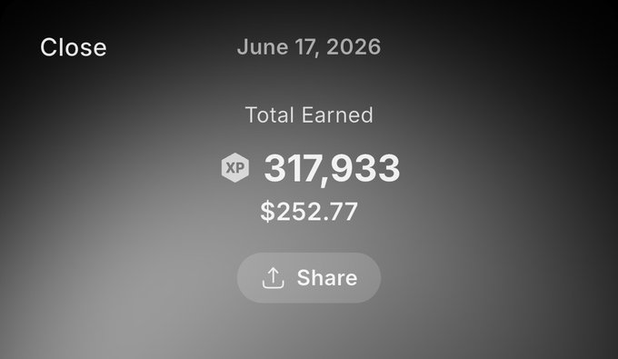 The image shows a screen with text on it that appears to be from an iPhone app or webpage. The main content of the image is a summary of a card transaction made by the user, which includes details such as XP points gained, amount spent, and possibly rewards earned. The text seems to be a mix of English and other languages. There are also smaller images in the background that further illustrate the concept of XP points, money, and rewards for a purchase.