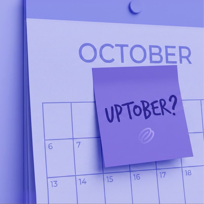 A purple-themed calendar page showing 'OCTOBER' with a sticky note attached that reads 'UPTOBER?'.