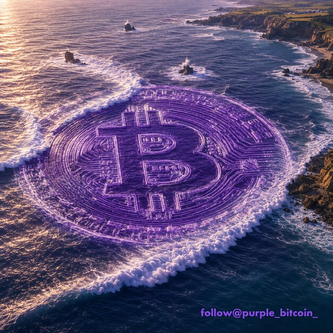 An aerial view of a coastline where a circular pattern resembling a Bitcoin logo is formed in the ocean waves, glowing with purple hues, with the watermark 'follow@purple_bitcoin_'.