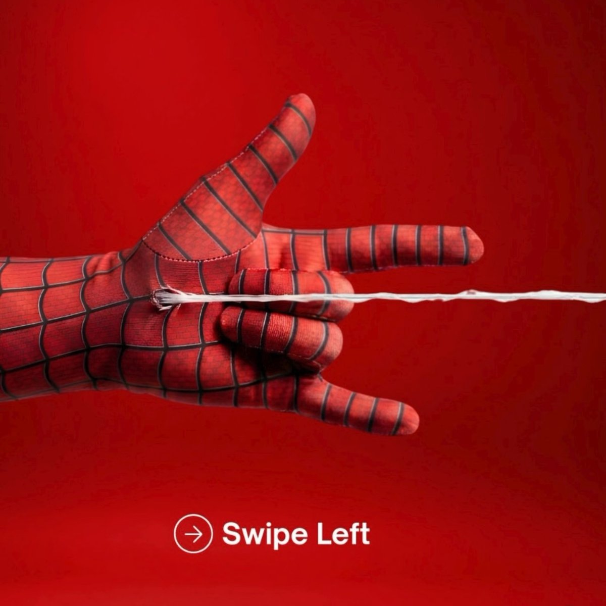 A hand in a Spider-Man costume shoots a white web against a vibrant red background, accompanied by a 'Swipe Left' prompt with an arrow icon.