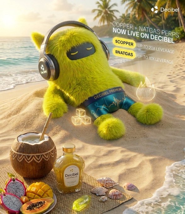 This poster shows a yellow plush toy sitting on a beach near some coconuts and fruit. The text says "@DecibelTrade", which could be a company logo or name related to the item shown. The main focus of this advertisement is the tropical setting and the plush toy, suggesting that it could be a product for a vacation, beach-themed event, or a gift.