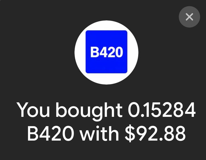 A dark notification screen showing a blue B420 token icon with the text 'You bought 0.15284 B420 with $92.88'.