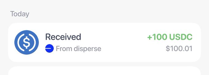 A digital wallet transaction notification showing 'Received +100 USDC' from 'disperse', with a balance of $100.01.
