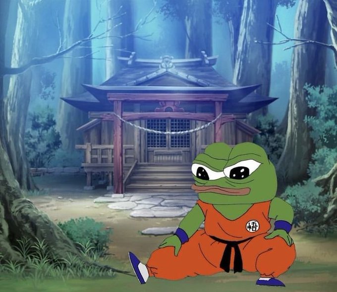 The image features a cartoon frog wearing an orange suit, sitting next to a wooden house surrounded by trees. The frog appears to be posing for the camera with a serious expression. The background of the image includes a forest setting, which adds to the overall atmosphere of the scene.