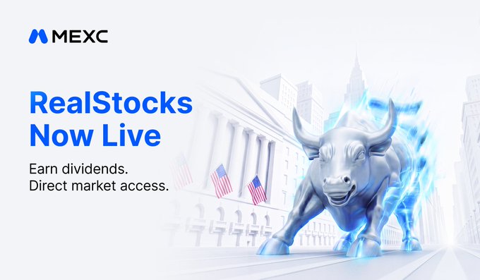 The image features a large bull statue with horns standing next to a building. The text "MEXC" is written above the bull, indicating that this is an advertisement for MEXC's RealStocks platform. The bull statue represents the bull market, and the building symbolizes the financial markets. The phrase "RealStocks Now Live" suggests that the platform is now available to users worldwide.