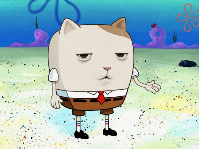 A still from the animated show SpongeBob SquarePants featuring a grumpy-looking cat character with a white and brown coat, wearing a white collared shirt, red tie, brown shorts, and striped socks, standing on the sandy ocean floor with one hand gesturing.