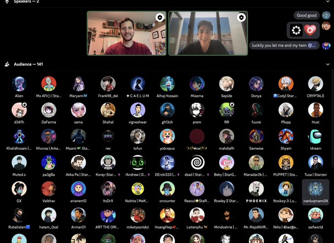 A virtual event screenshot showing two speakers in video panels at the top with 141 audience members displayed as circular avatar icons below, with a chat message reading 'luckly you let me and my twin @...' visible.