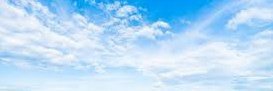 A vertical abstract image showing wispy white clouds or smoke streaks against a light blue sky background.