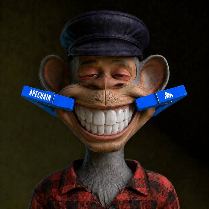 A 3D-rendered NFT-style image of a cartoon monkey character wearing a blue cap and red plaid shirt, with two blue clamps labeled "APECHAIN" pinching its cheeks, exposing a wide grinning smile.