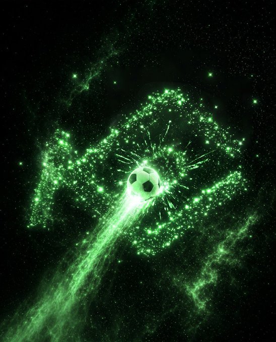 A glowing green soccer ball bursts through a swirling cosmic nebula, emitting a bright energy trail across a starry black background.