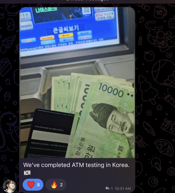 A screenshot of a social media post shows a hand holding Korean 10,000 won bills in front of an ATM screen, with text reading 'We've completed ATM testing in Korea.' and '8' likes, '2' fire reactions at 10:51 AM.
