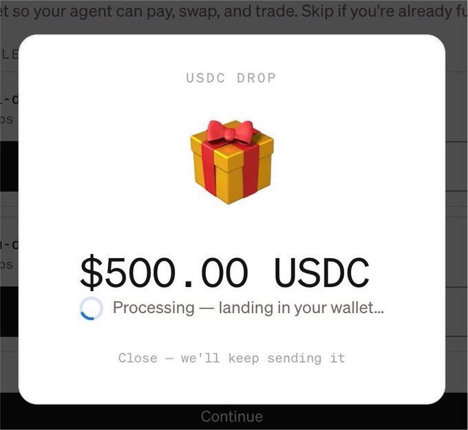 A screenshot showing a "USDC DROP" pop-up from Moonpay displaying a $500.00 USDC reward with a gift box icon and the message "Processing — landing in your wallet..." with a note that closing the window will result in continued sending of the payment.