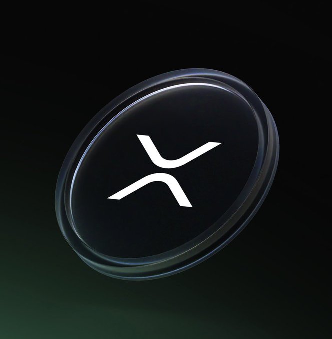 The image shows a stylized XRP logo on a glossy black circular coin with an "X" design. It visually represents Ripple's XRP cryptocurrency, tying directly to the news that Ripple is upgrading the XRP Ledger with quantum-resistant security to prepare for "Q-Day."