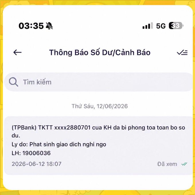 A screenshot of a TPBank notification in Vietnamese informing a customer that their account ending in 2880701 has been fully frozen due to suspicious transactions ("Phát sinh giao dịch nghi ngờ"), received on June 12, 2026. This illustrates the post's point about a Vietnamese bank freezing an account following a P2P USDT transaction on Binance.