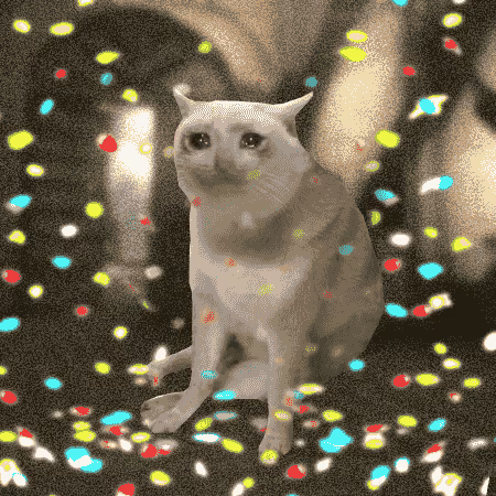 A slightly grainy, surreal image shows a white cat sitting upright with a serious expression, surrounded by colorful confetti-like particles against a dark background.