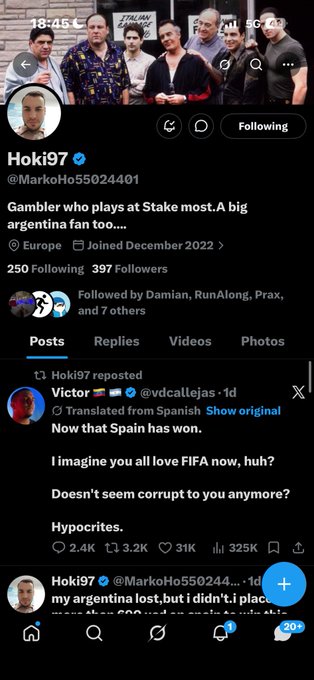 A Twitter profile for "Hoki97" (@MarkoHo55024401) showing 250 Following and 397 Followers, displayed as a self-described gambler at Stake and Argentina fan, with a reposted message from Victor (@vdcallejas) reading "Now that Spain has won. I imagine you all love FIFA now, huh? Doesn't seem corrupt to you anymore? Hypocrites," which connects to the accompanying post congratulating a first win.