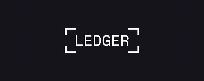The Ledger logo displayed in white text inside bracket-like frames on a black background.