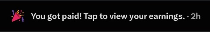 A black notification banner with a party popper icon and white text stating 'You got paid! Tap to view your earnings. • 2h'.