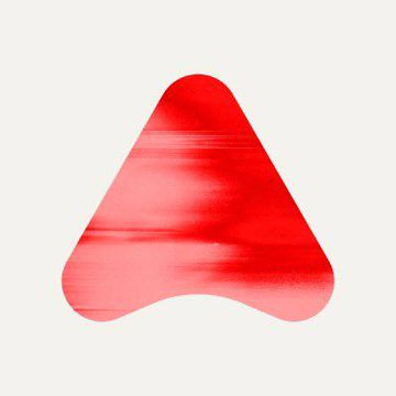 A glossy red rounded triangular icon or logo with a smooth gradient finish on a light gray background.