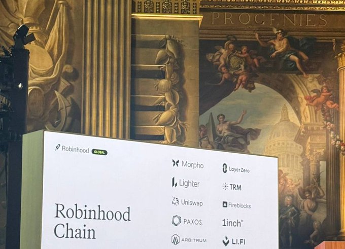 A presentation screen at a Robinhood event displays "Robinhood Chain" alongside partner logos including Morpho, Lighter, TRM, Uniswap, LayerZero, Paxos, Fireblocks, 1inch, Arbitrum, and LI.FI, set against an ornate classical fresco backdrop. The image relates to the post by showing the official Robinhood event where Lighter was mentioned among other partners during the discussion of perpetuals.