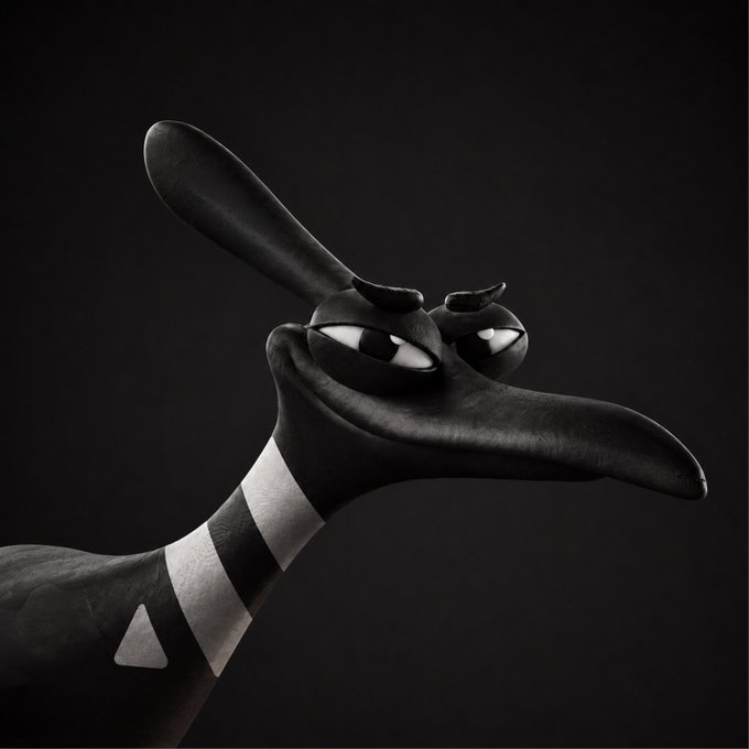 A sleek black stylized creature or character with a long snout, pointed ears, and a white-collared neck is shown against a dark background.
