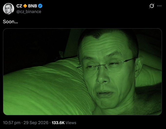A tweet from CZ (cz_binance) posted at 10:57 pm on 29 Sep 2026 with 133.6K views, captioned 'Soon...' and featuring a green-tinted nighttime photo of him lying on a pillow.