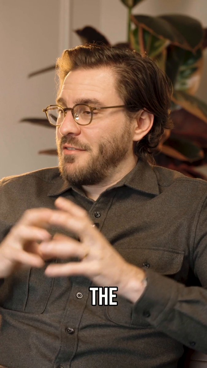 The image features a man wearing glasses sitting down with his hands together while looking at something off-camera. The caption reads "The sofi launched their Stablecoin. PayPal, MetaMask, Phantom, KAST all have their own." This suggests that there is an ongoing discussion or event related to stablecoins and the cryptocurrency market in general.