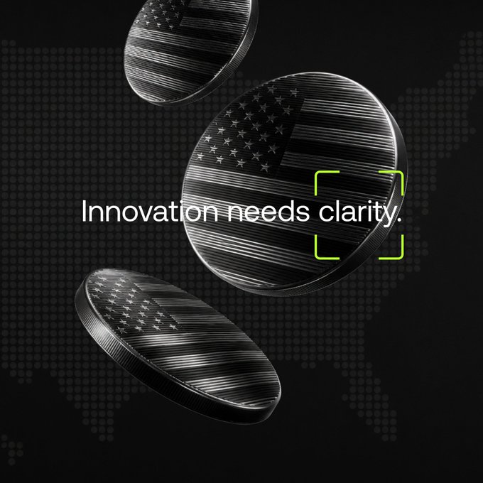 Three metallic coins engraved with the American flag float against a dark background featuring a dotted map of the United States, overlaid with the white text "Innovation needs clarity." The imagery ties directly to the post's message by framing U.S. innovation and economic policy as needing greater clarity and direction.