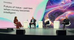 A panel discussion on stage at an Innotribe event titled 'Future of Value - part two: When money becomes Intelligent', featuring four seated speakers.
